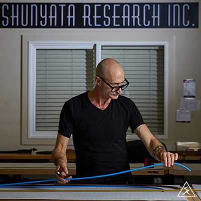 Wire spools being cut and prepared at Shunyata Research